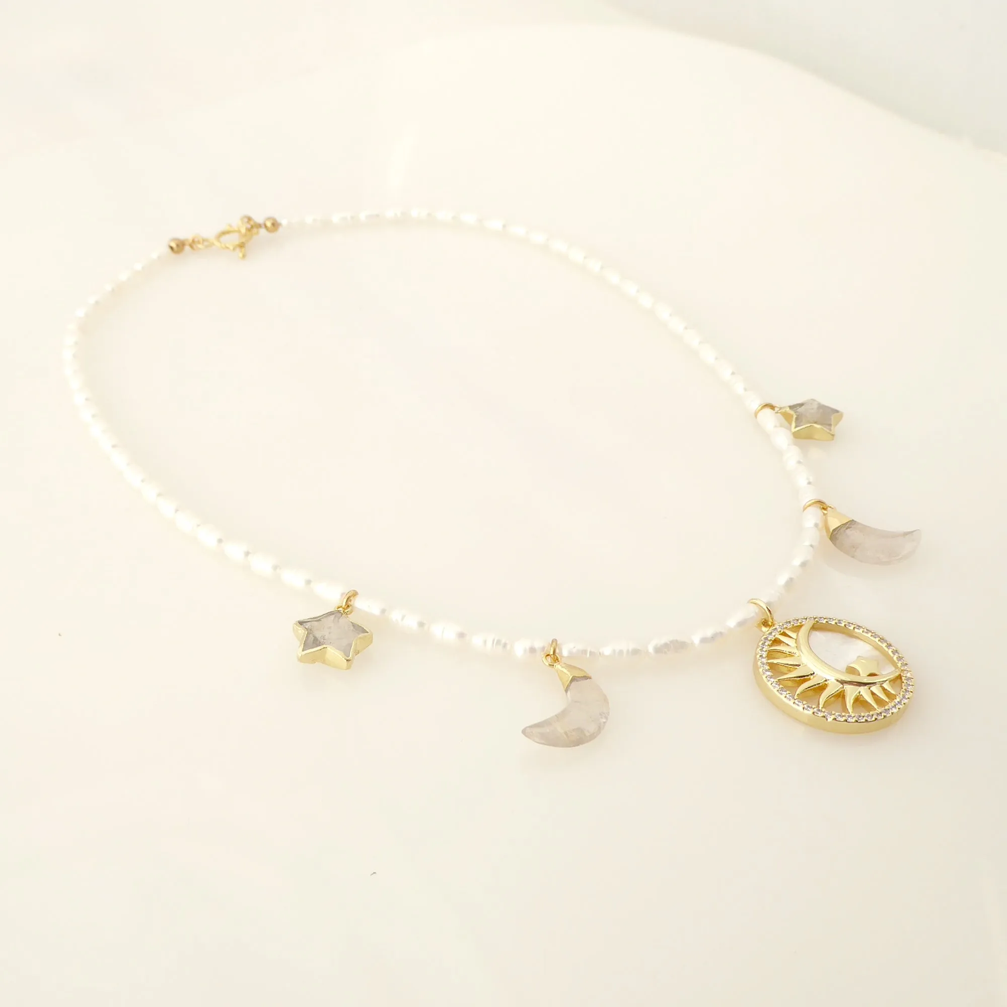 Crescent and star pearl necklace