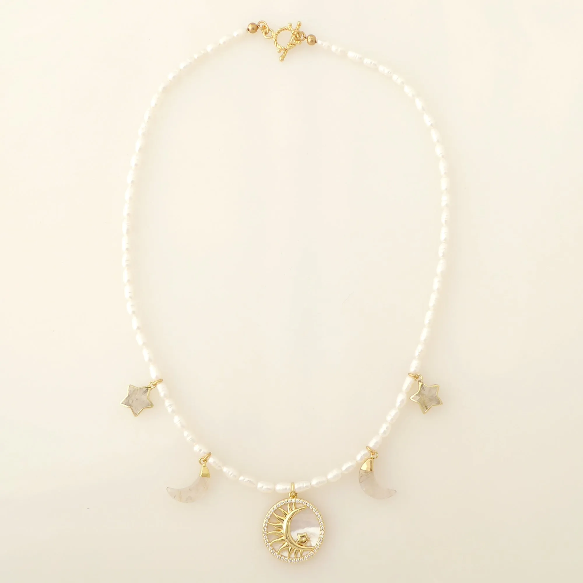 Crescent and star pearl necklace