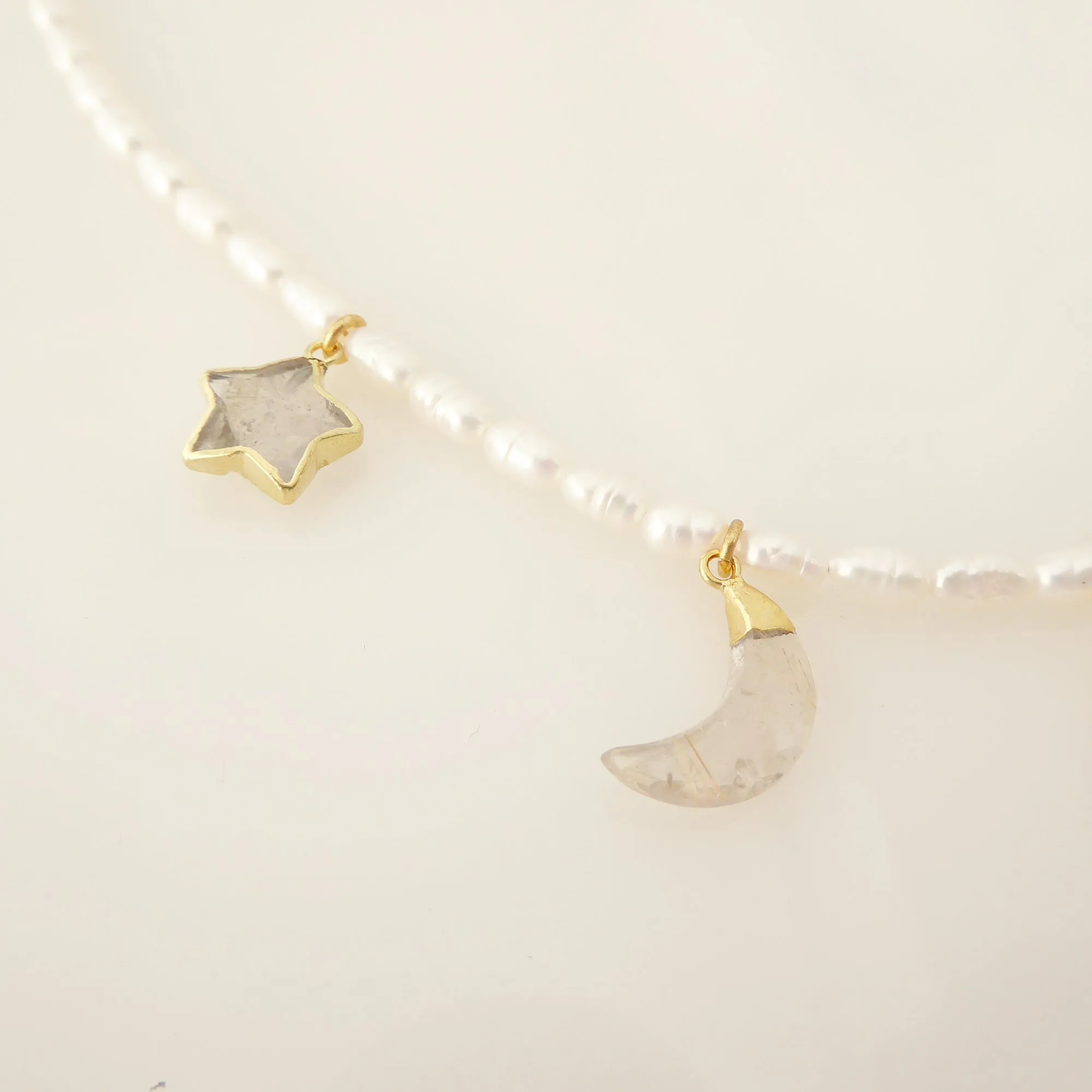 Crescent and star pearl necklace