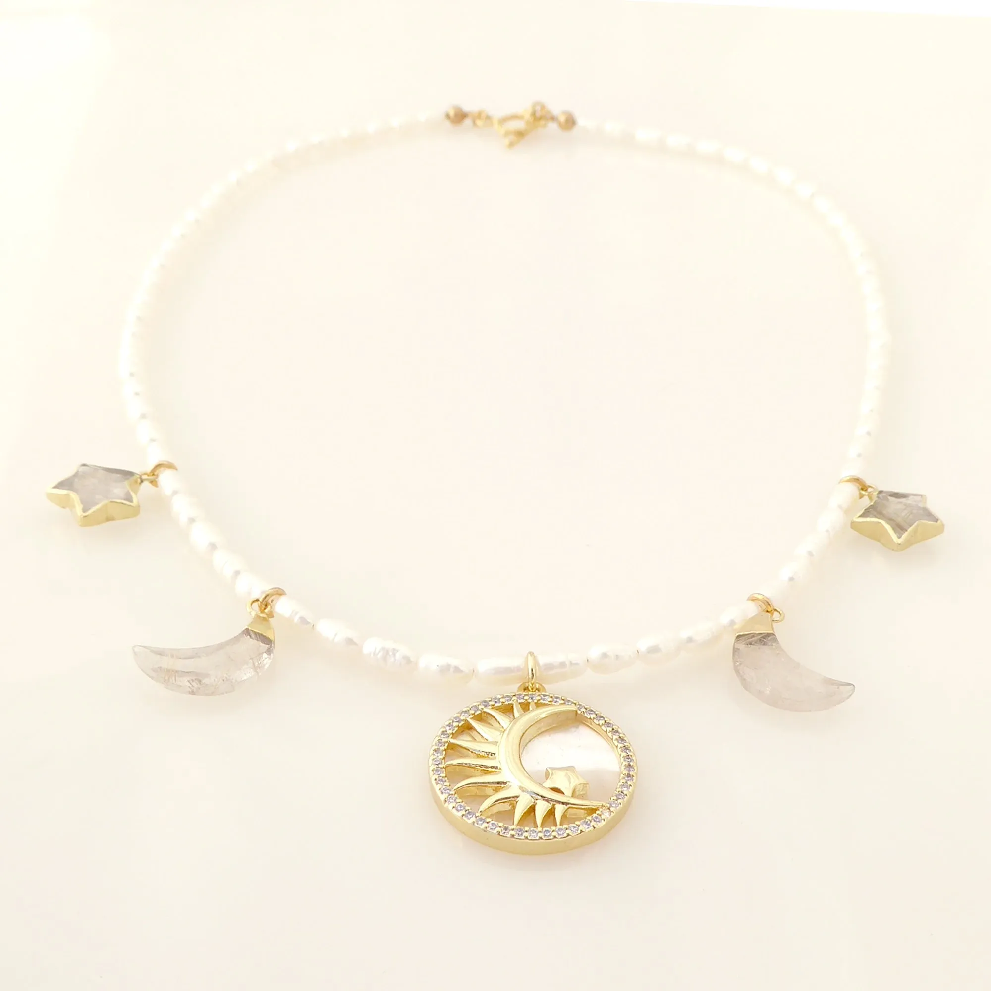 Crescent and star pearl necklace