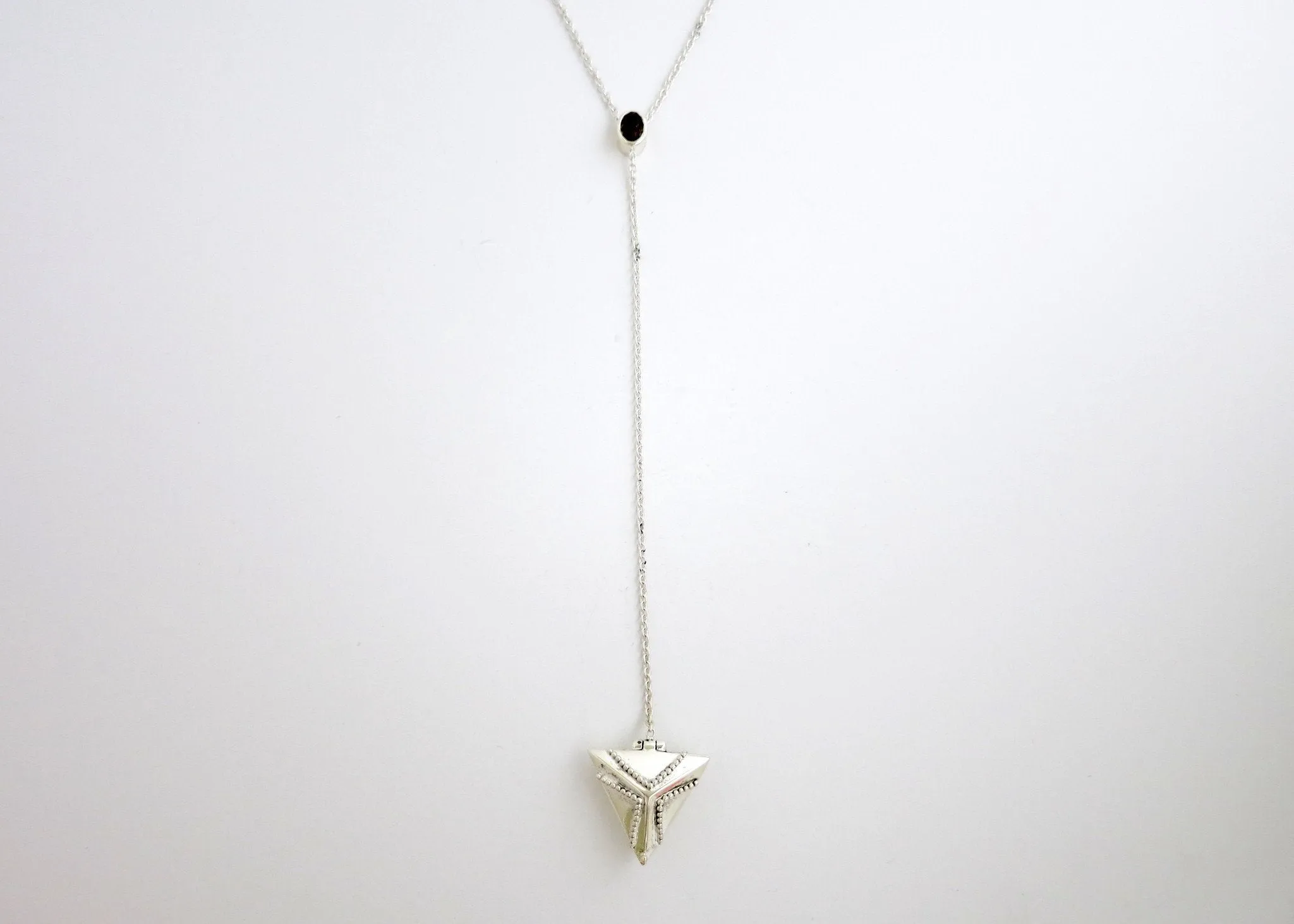 Elegant, vintage-inspired, sterling silver lariat necklace with a triangular granulation-work locket