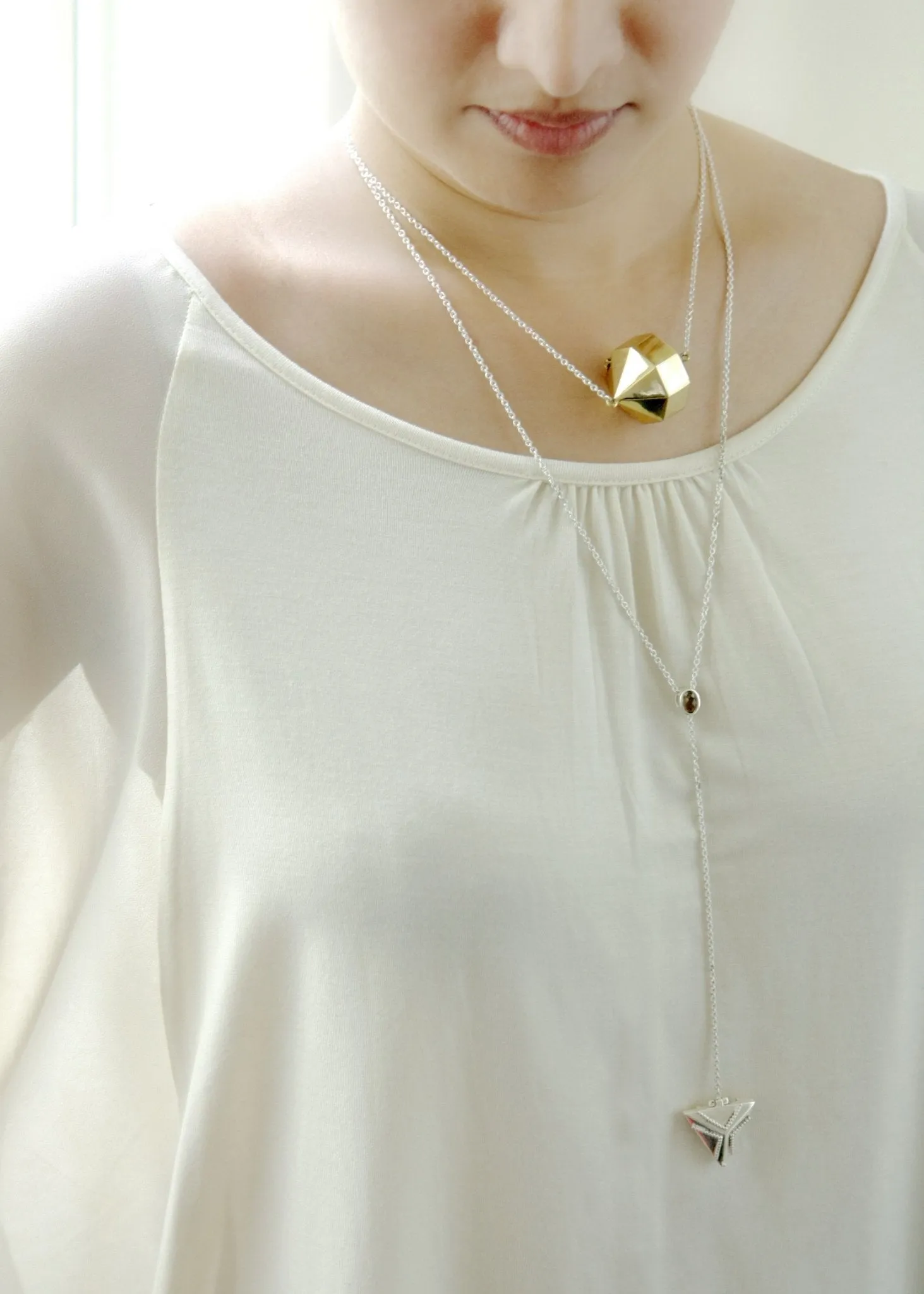 Elegant, vintage-inspired, sterling silver lariat necklace with a triangular granulation-work locket