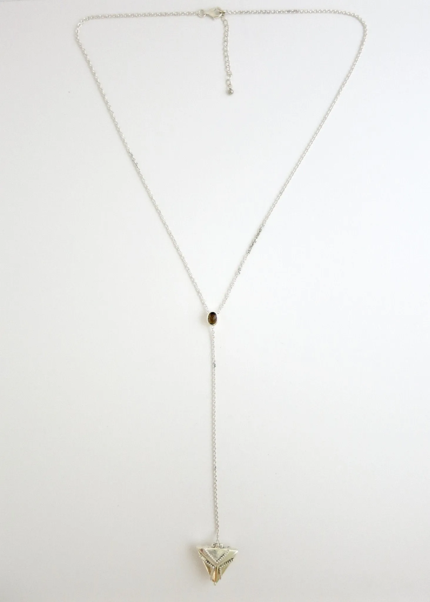 Elegant, vintage-inspired, sterling silver lariat necklace with a triangular granulation-work locket