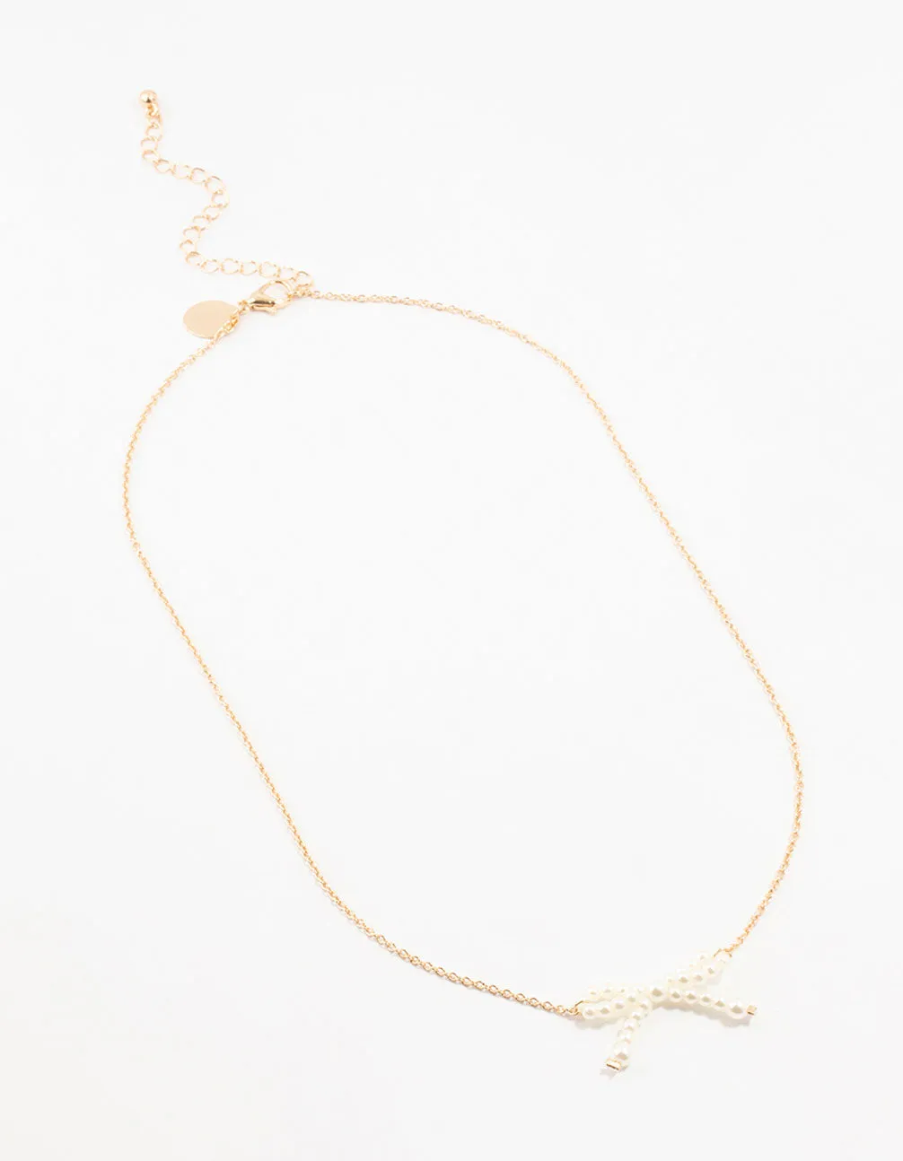 Gold Pearl Bow Necklace