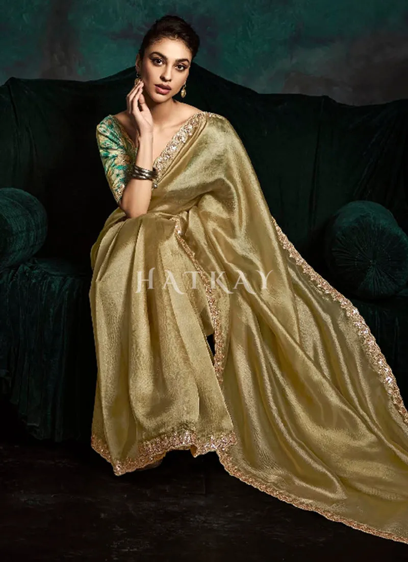 Golden Yellow And Green Tissue Silk Saree