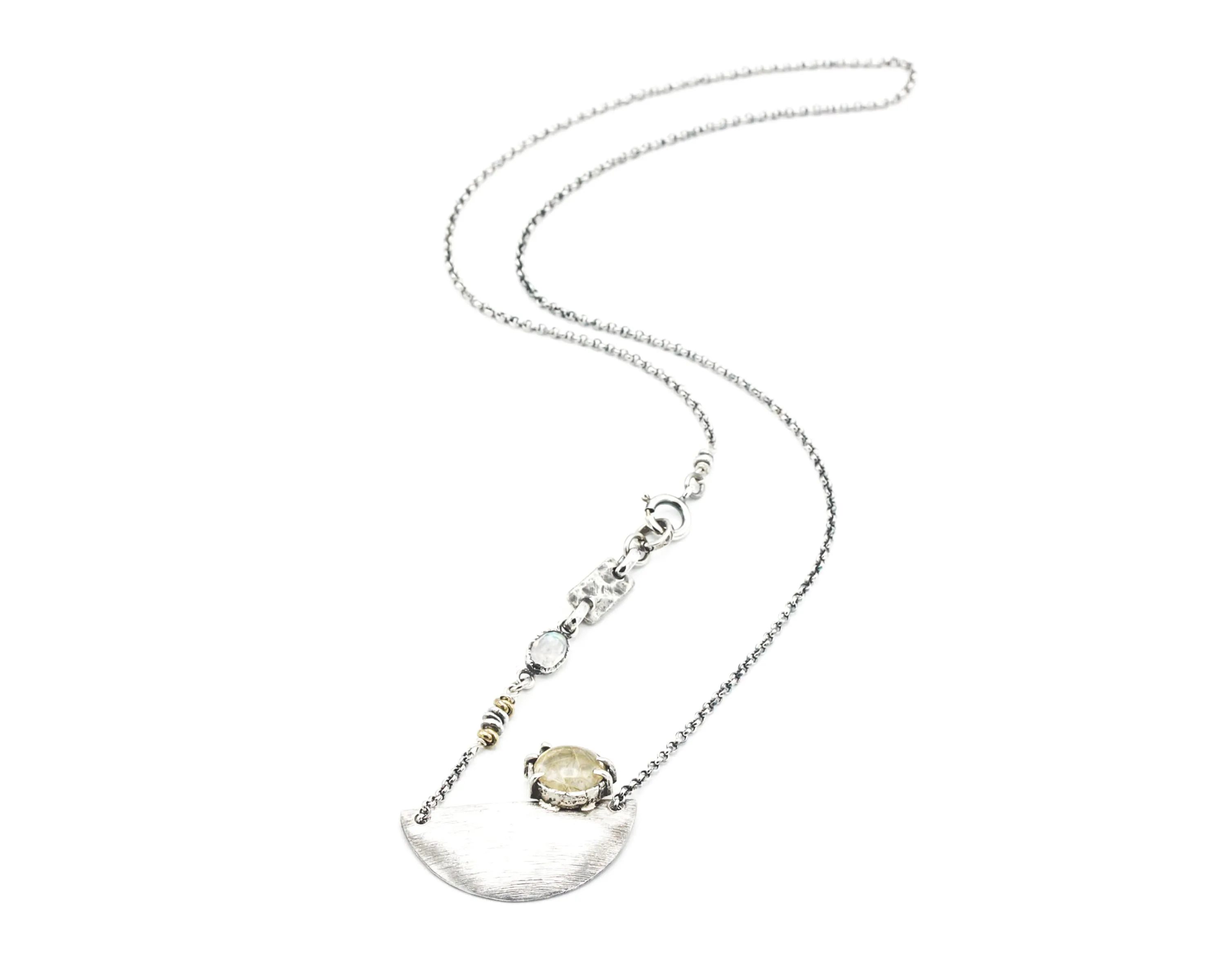 Rutilated quartz cabochon pendant necklace with silver plate in semi-oval shape on sterling silver chain