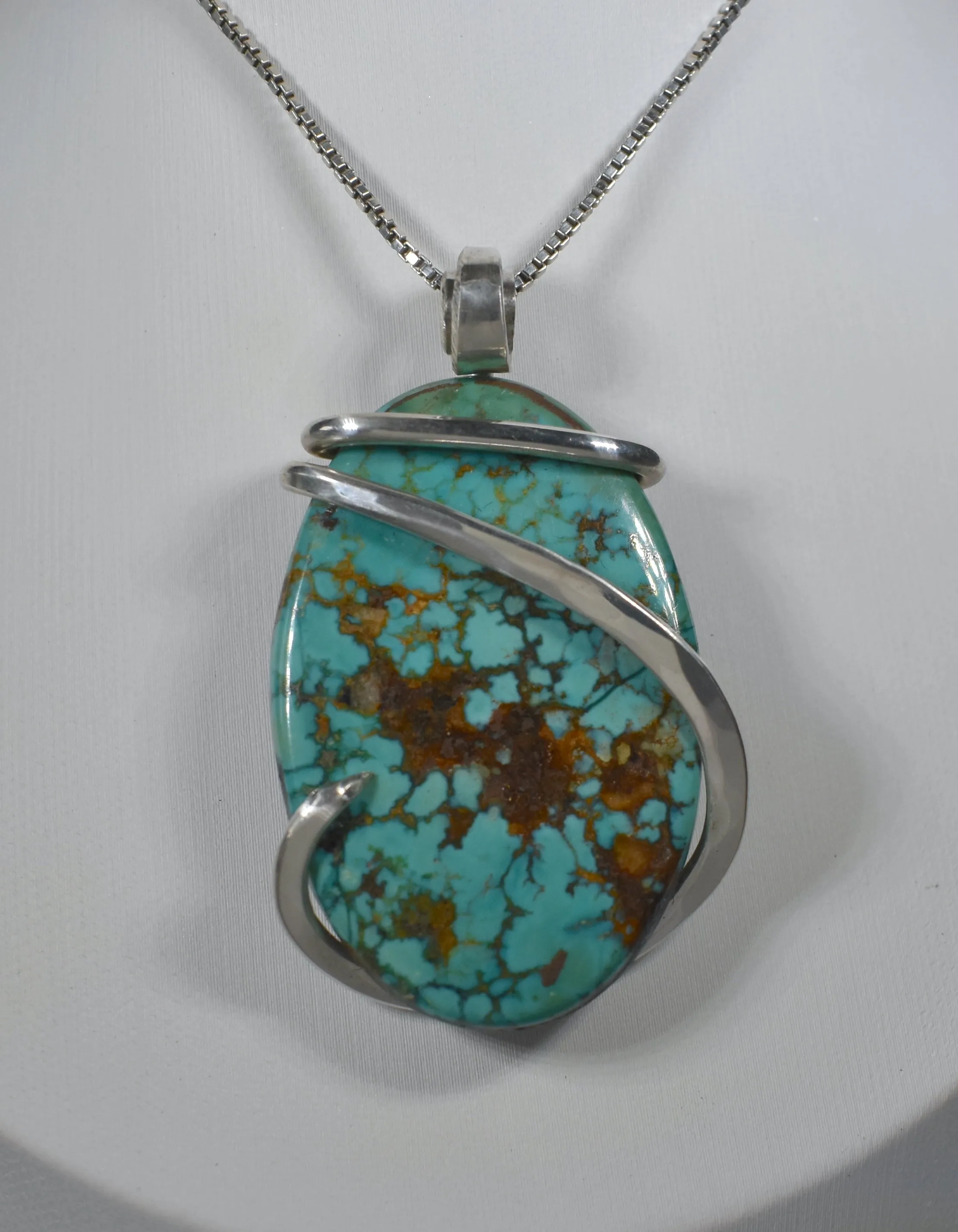 Tyrone Turquoise Handmade Stone Pendant Wrapped in Silver