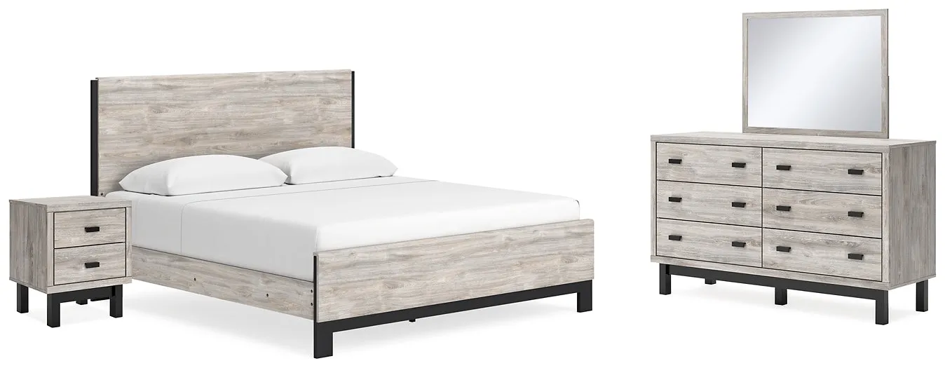 Vessalli King Panel Bed with Mirrored Dresser and Nightstand
