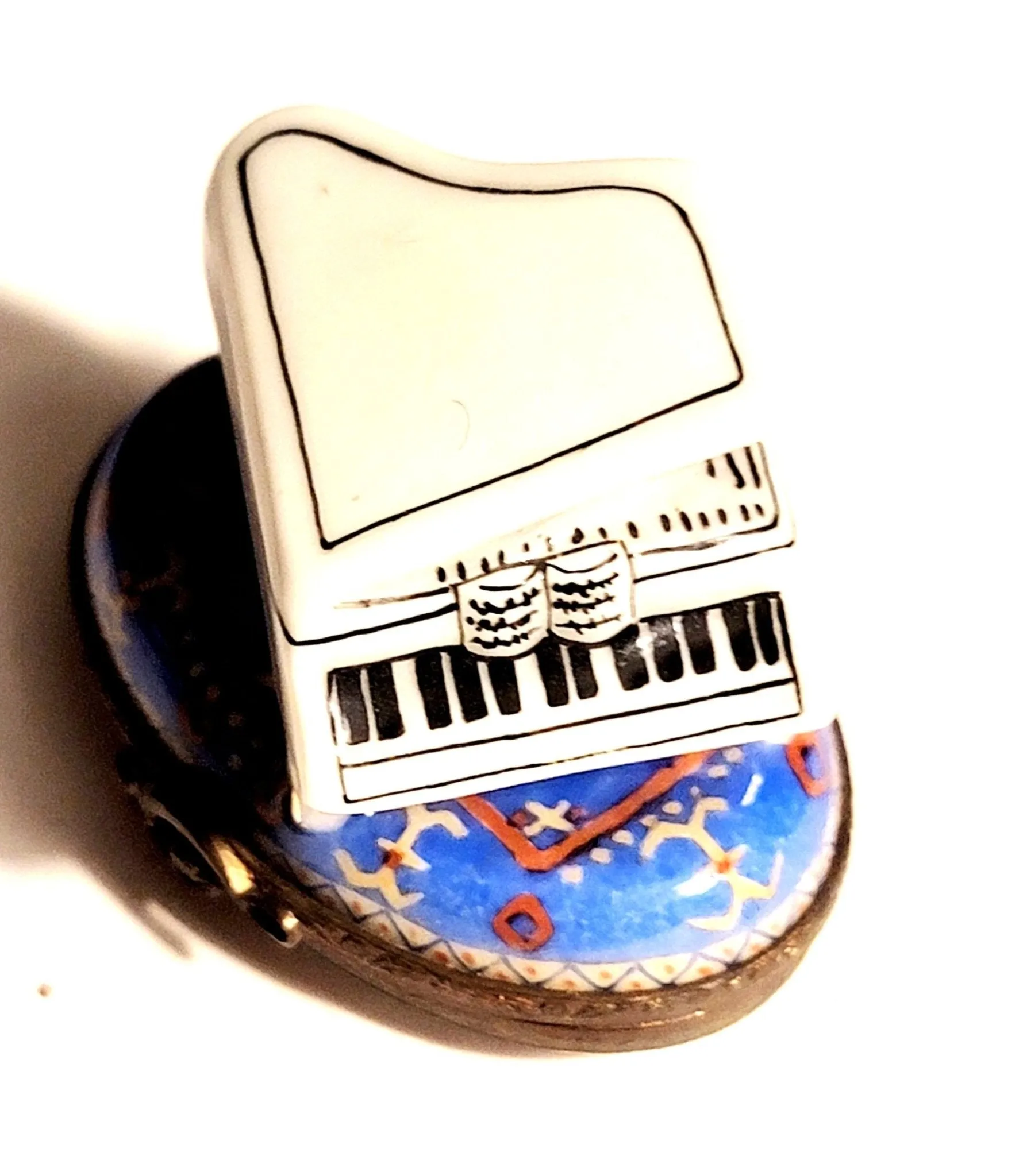White Piano on Blue